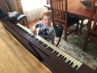 Brooks Playing Piano